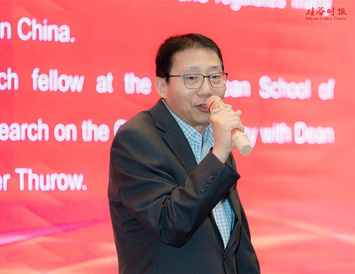 Yunshi Wang of the China Center for Energy and Transportation speaking at the ceremony